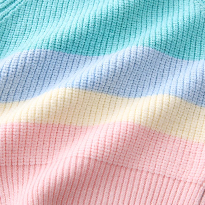 Close-up of multicolored textured fabric with shades of blue, pink, and yellow.