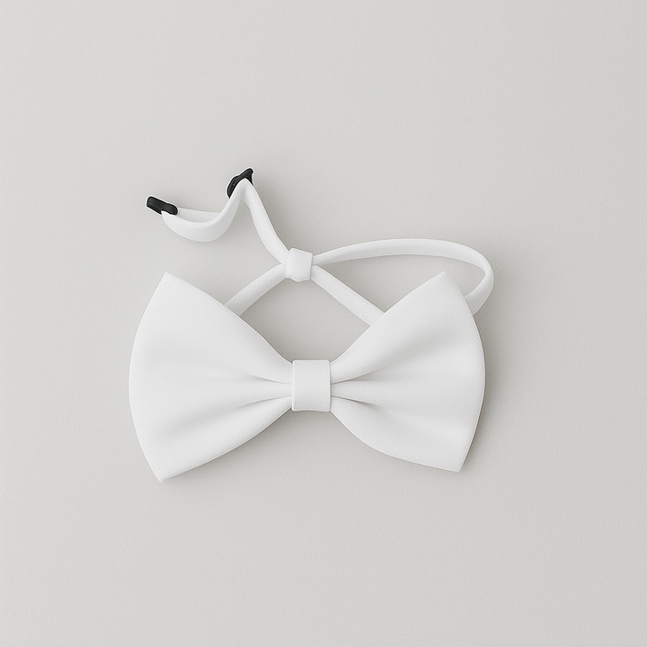 White bow tie for babies with adjustable strap.
