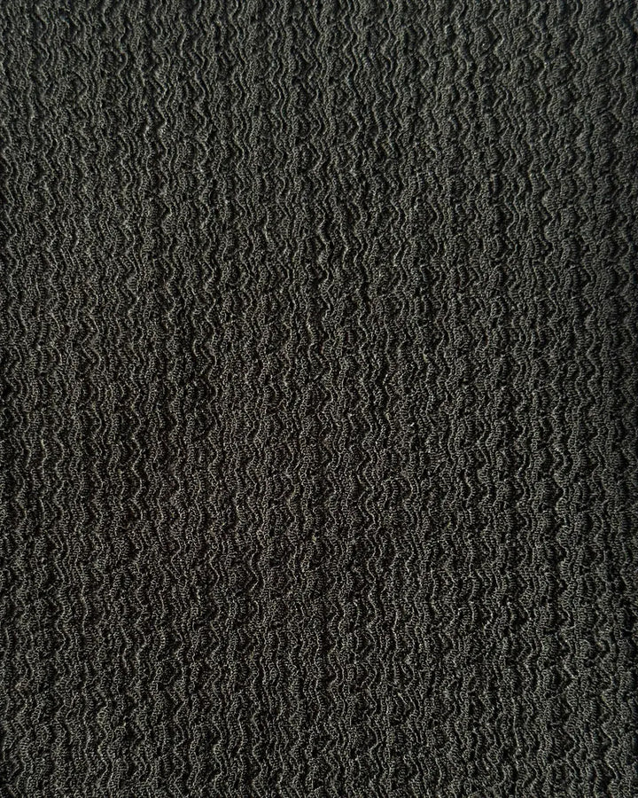 Textured black patterned fabric