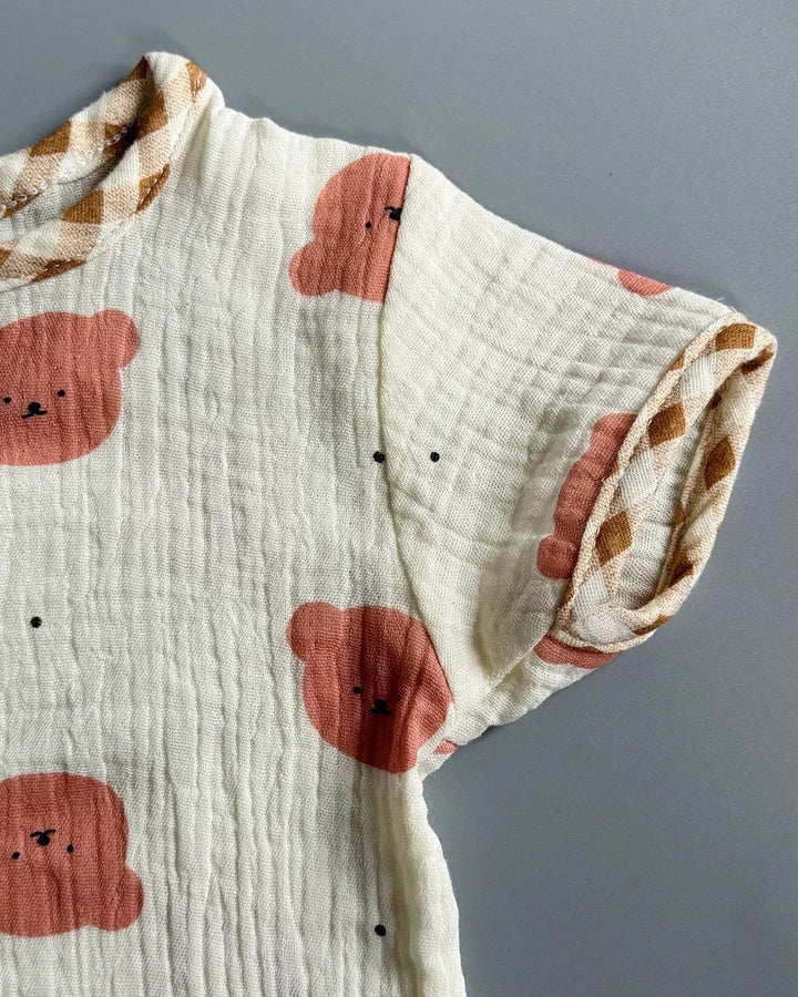 Baby blanket with bear pattern on a gray background