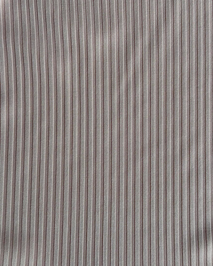 Close-up of gray fabric with subtle striped pattern