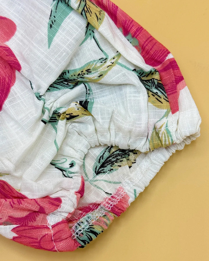 Floral-patterned diaper on a beige background