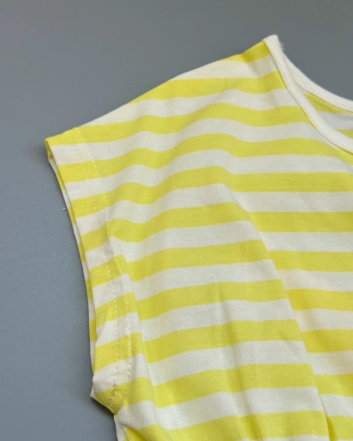 Yellow and white striped fabric on a gray background