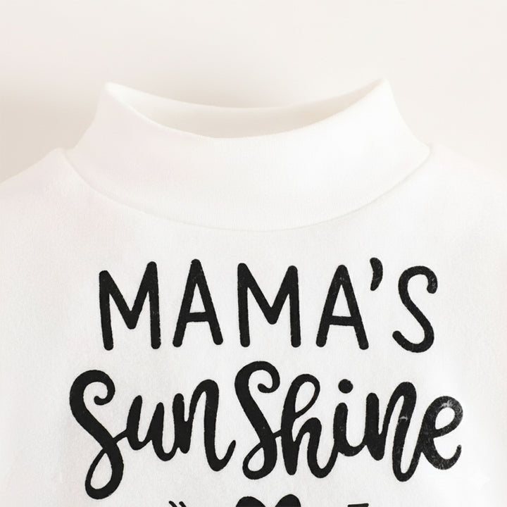 White shirt with 'Mama's Sunshine' text on a plain background