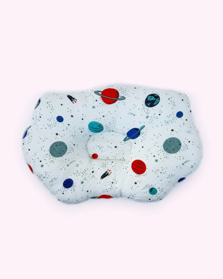 Children's travel pillow with space-themed design on a white background