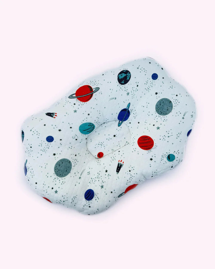 Children's pillow with space-themed design on a white background