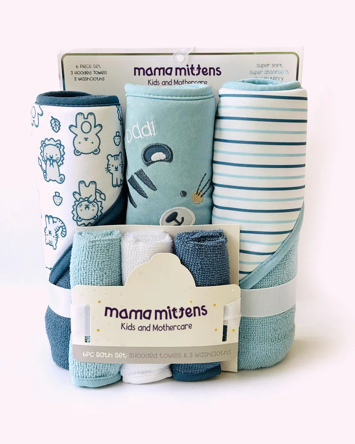 Packaged baby clothing set with 'mama mittens' branding on a white background