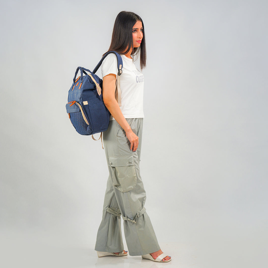 mom with dark blue maternity bag