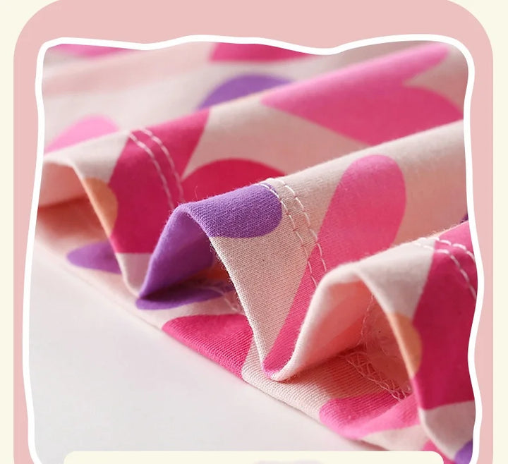 Close-up of pink and purple fabric with a pink border