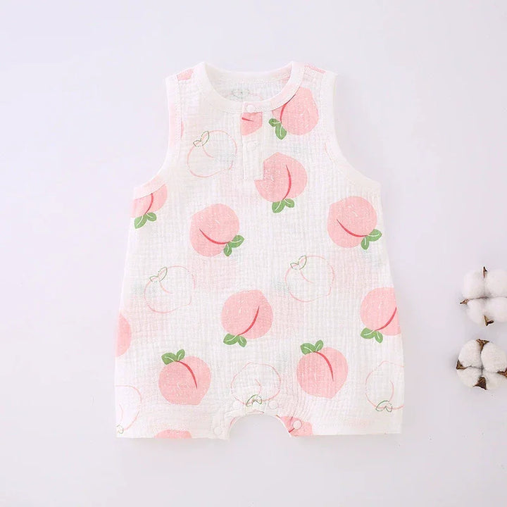 Baby romper with peach pattern on a white background