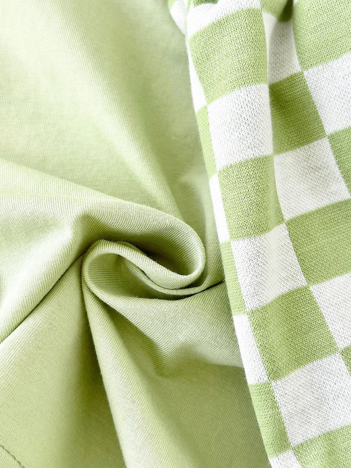 Close-up of green fabric with a checkered pattern