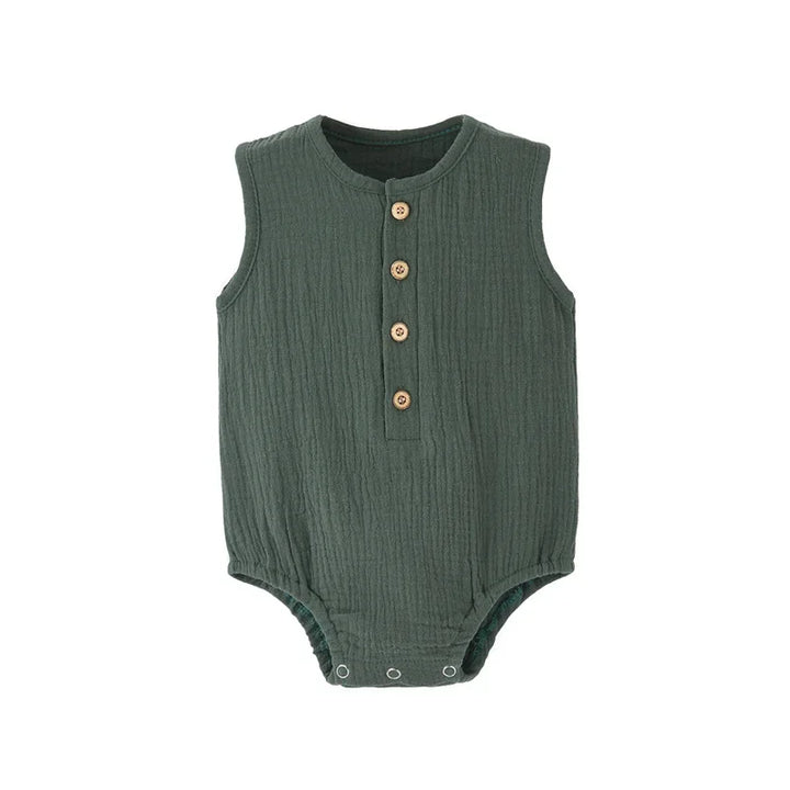 Green ribbed baby bodysuit with button details on a white background