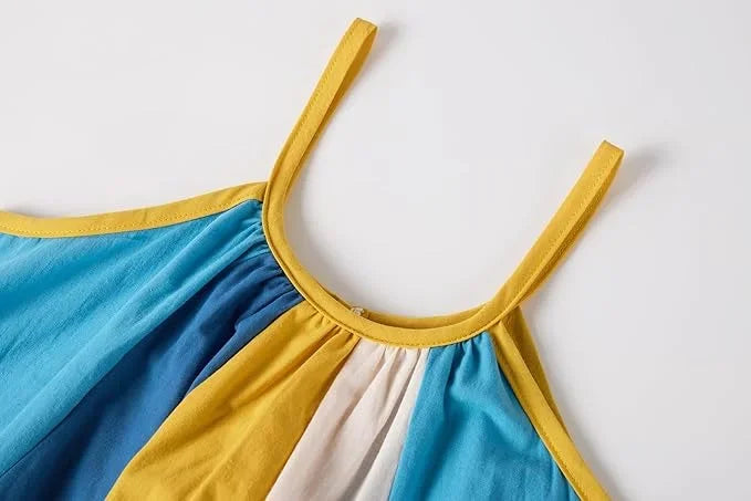 Color-blocked dress with yellow straps on a white background