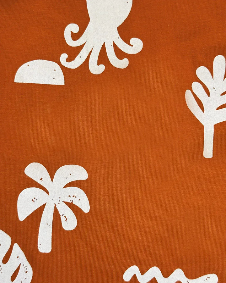 White octopus, palm trees, and wavy lines on a rust-colored background