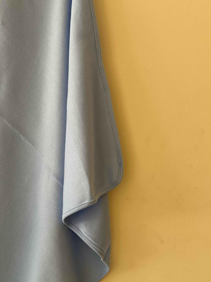 Gray fabric on a yellow background