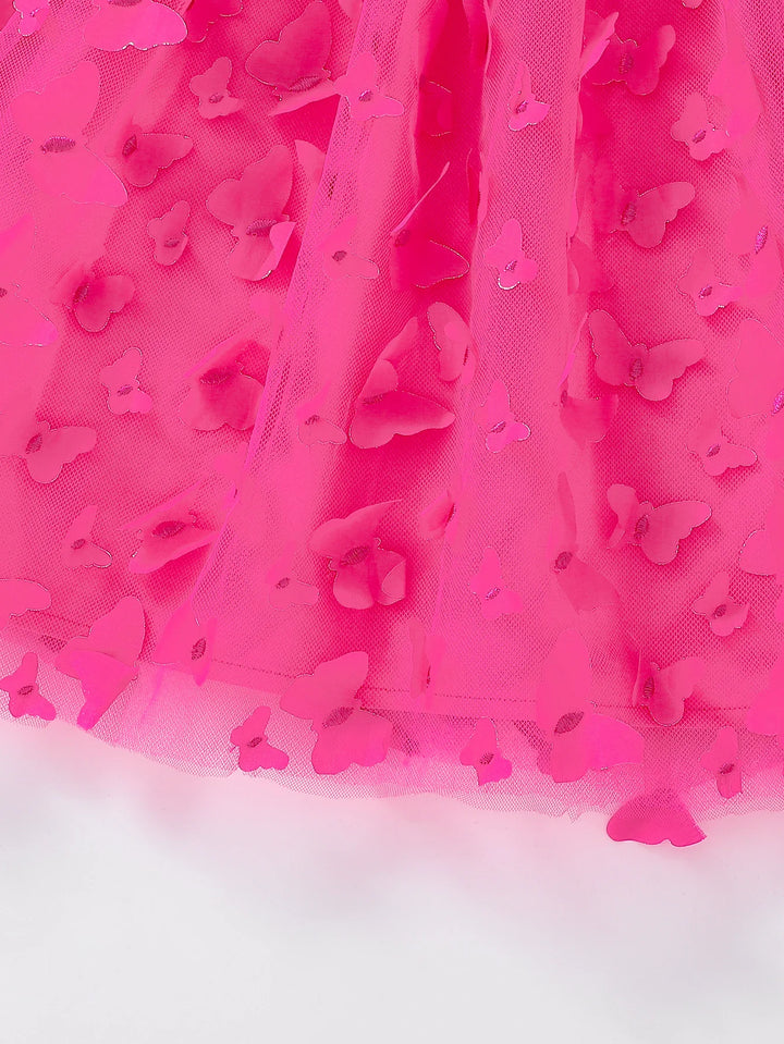 Close-up of a pink dress with butterfly patterns on a white background