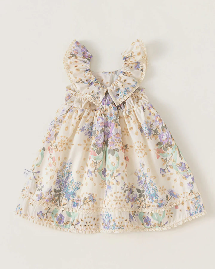 Floral dress with bow detail on a white background