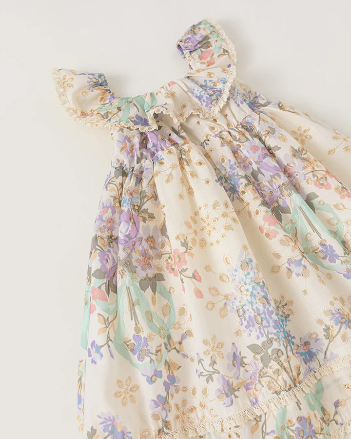 Floral dress with matching headband on a white background